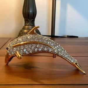 RHINESTONE DOLPHIN SHOULDER BROOCH WITH EMERALD GREEN EYES